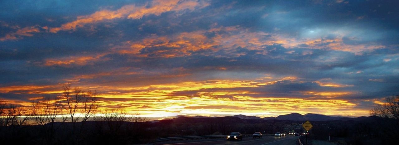 A glorious sunset provides a spectacular ending to the day for homebound drivers. One can almost feel their relief crossing the Rio Grande on their way home. Many of the residents of the Española Valley can trace their roots back to the time of Oñate and for the Pueblo Indians even further back. Like their ancestors of centuries past, they still travel El Camino Real home.